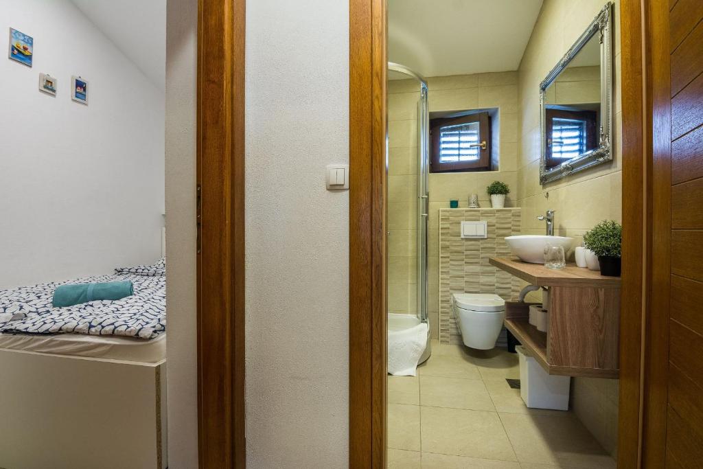 Kúpeľňa v ubytovaní Apartments Malcic