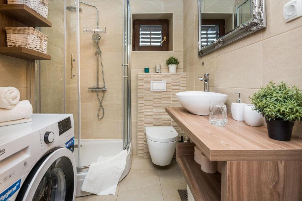 Kúpeľňa v ubytovaní Apartments Malcic