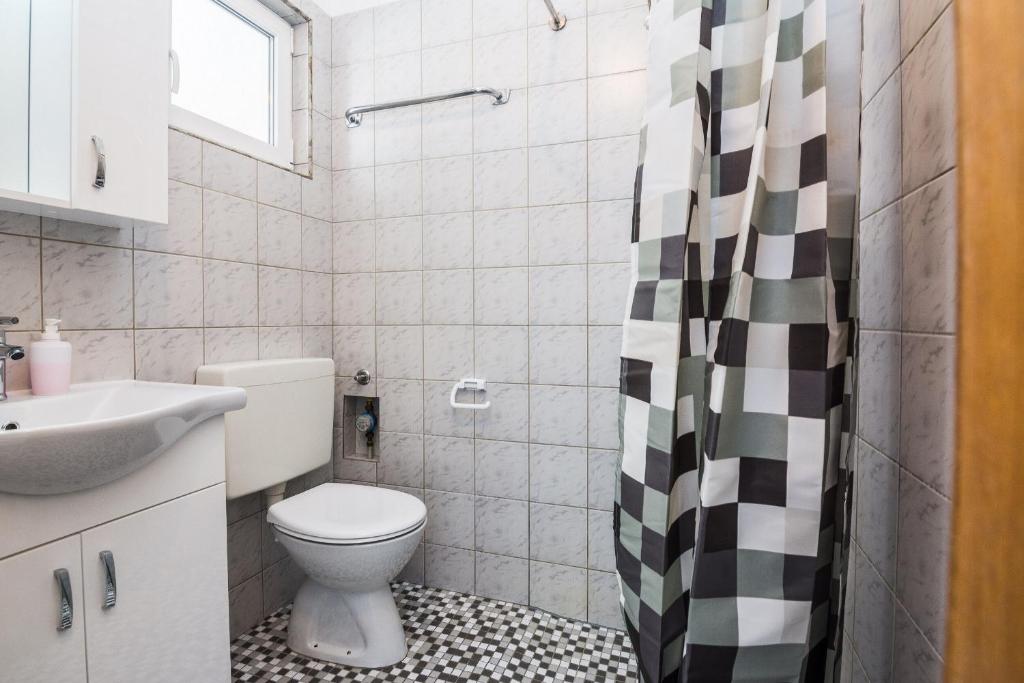 Łazienka w obiekcie Apartments Skundric