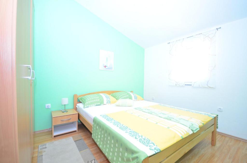 Postel nebo postele na pokoji v ubytování Apartments Brandis
