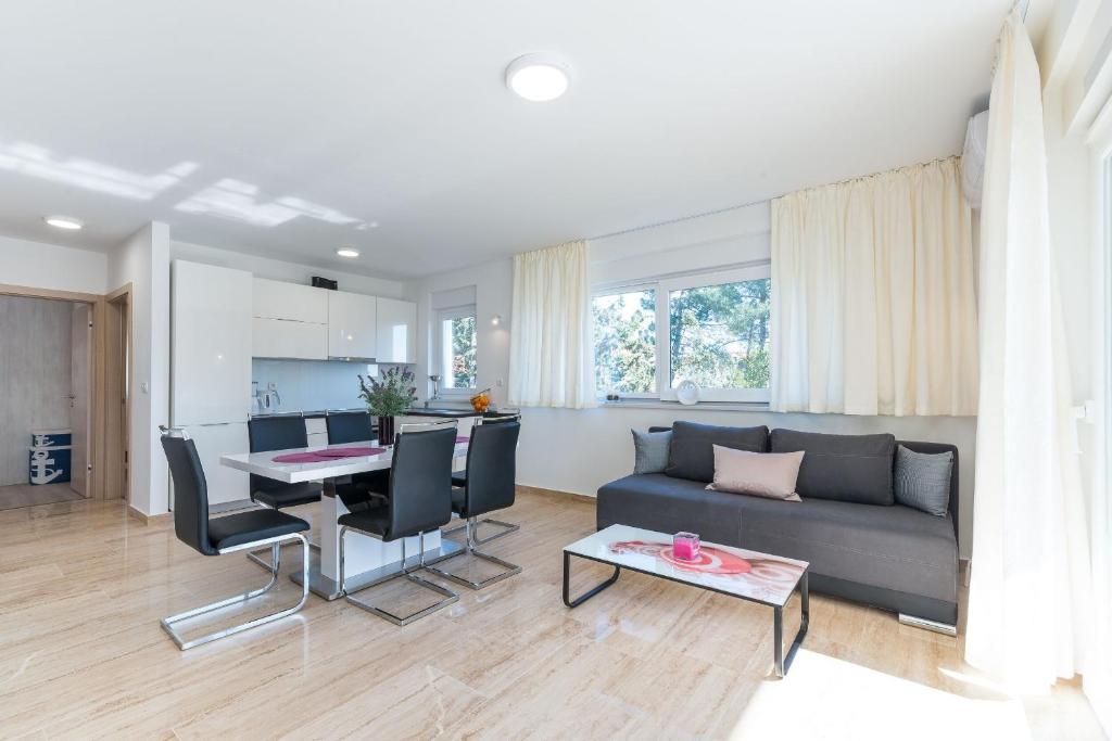 TV a/nebo společenská místnost v ubytování Apartment Martan