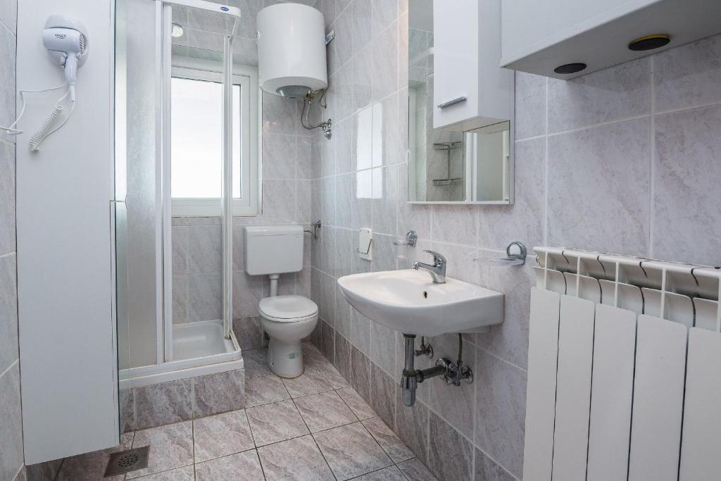 Koupelna v ubytování Apartments Napros