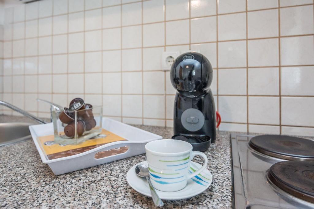 Príslušenstvo na prípravu kávy alebo čaju v ubytovaní Apartments Bojana