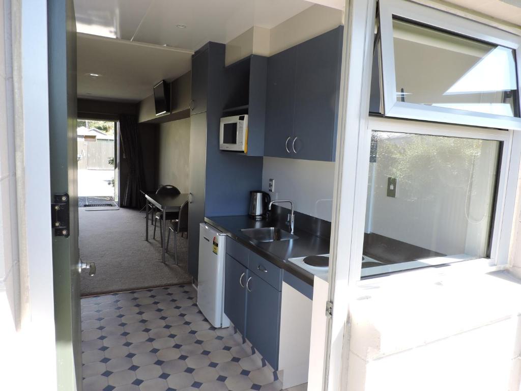 Kuchyň nebo kuchyňský kout v ubytování Andorra Motel
