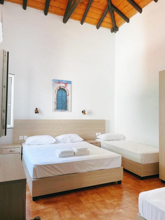 Postel nebo postele na pokoji v ubytování Villa Elpiniki