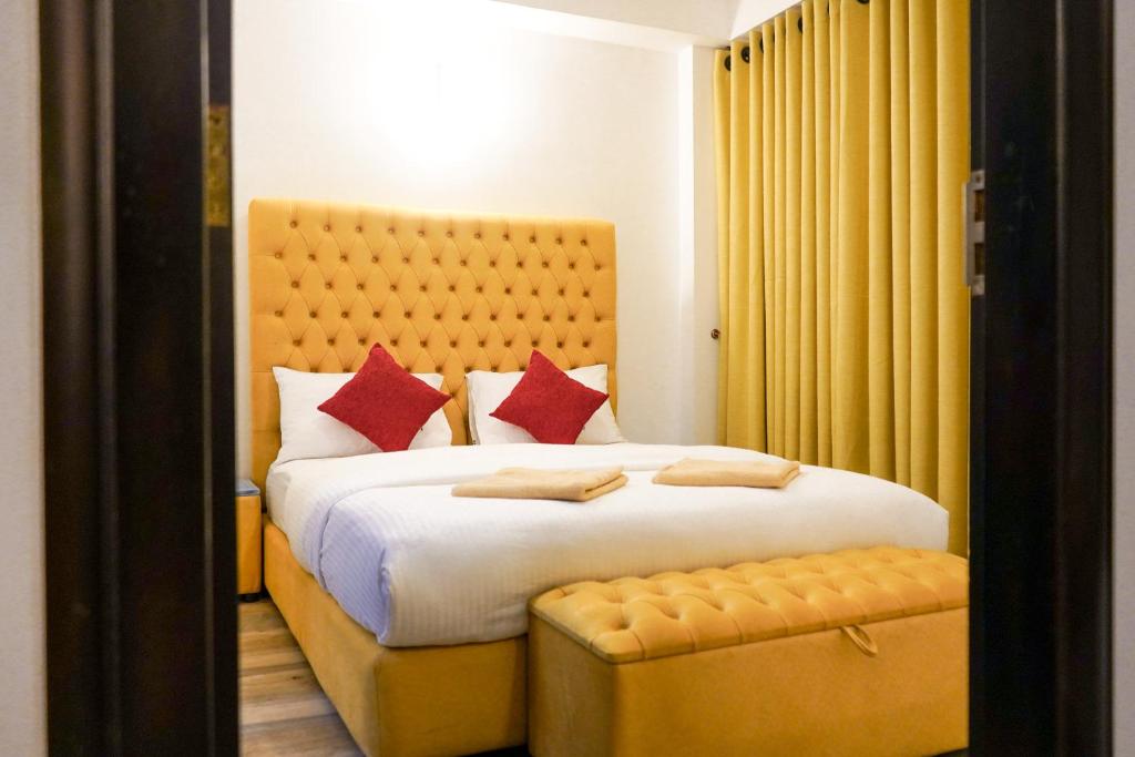 Un pat sau paturi într-o cameră la Vista Apartment Mariners Blue
