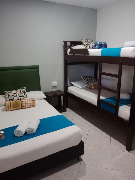Postel nebo postele na pokoji v ubytování Hotel El Deportista