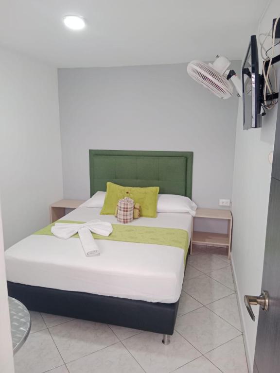 Postel nebo postele na pokoji v ubytování Hotel El Deportista