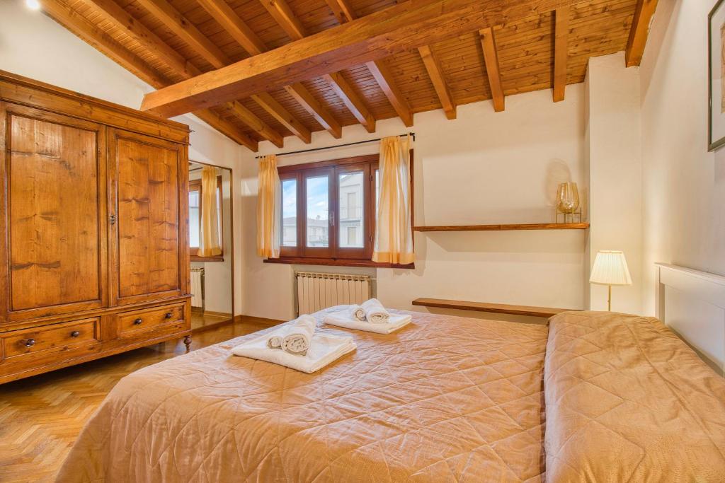 Postel nebo postele na pokoji v ubytování Casa Gedeone - Grand Canyon of Tuscany - Happy Rentals