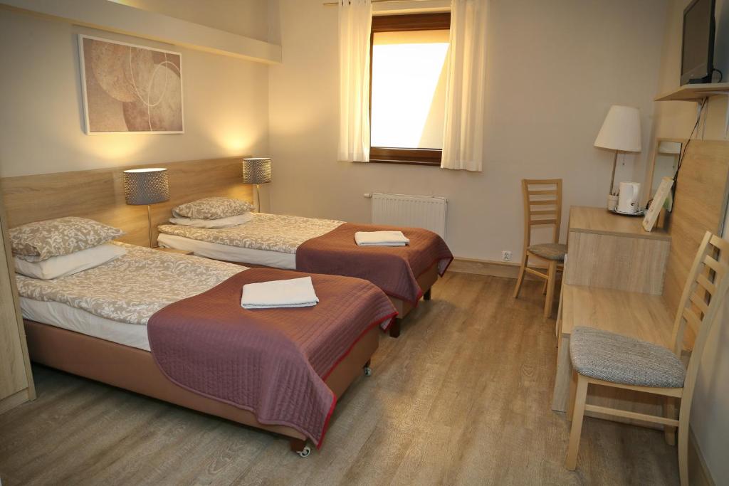 Posteľ alebo postele v izbe v ubytovaní B & B Tomula