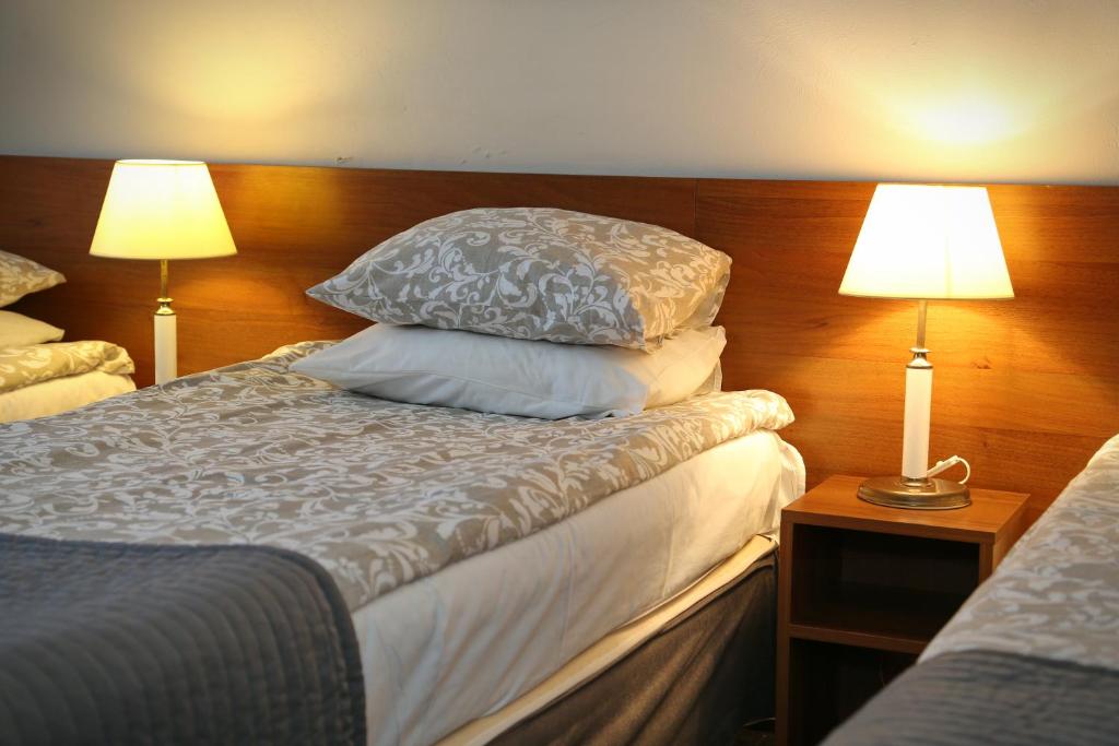 Posteľ alebo postele v izbe v ubytovaní B & B Tomula