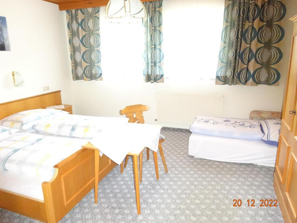 Postel nebo postele na pokoji v ubytování Haus Anna