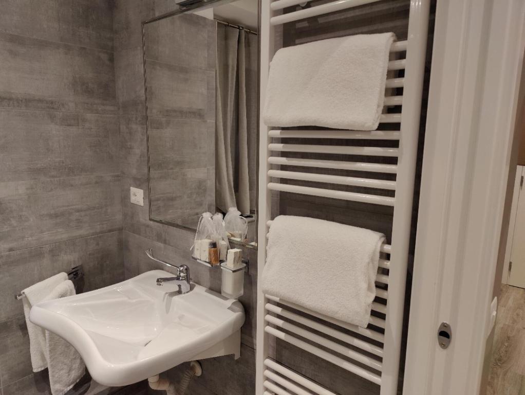 Koupelna v ubytování Ai Suma Hotel
