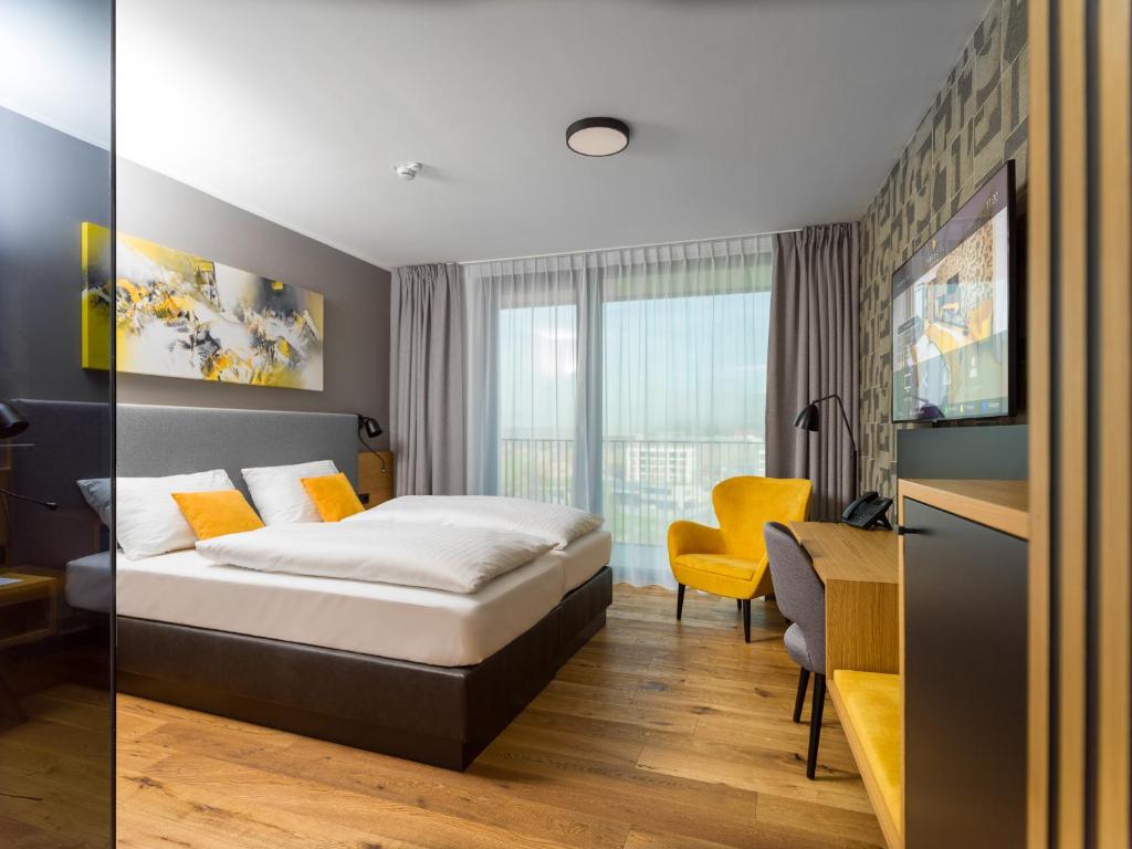 Postel nebo postele na pokoji v ubytování Best Western Parkhotel Hagenberg
