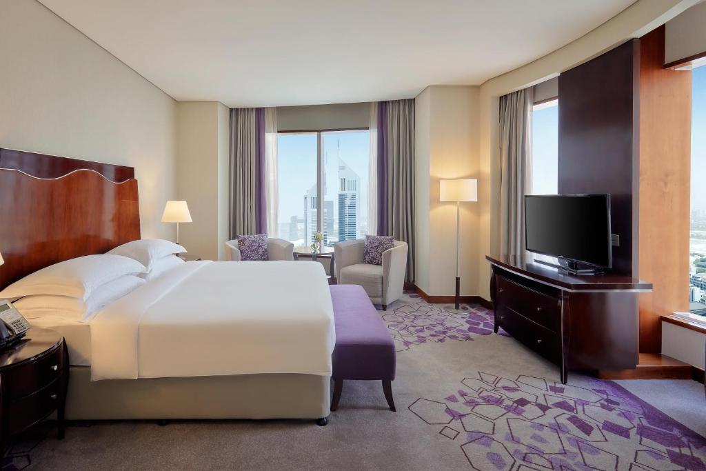 Postel nebo postele na pokoji v ubytování Rose Rayhaan by Rotana - Dubai