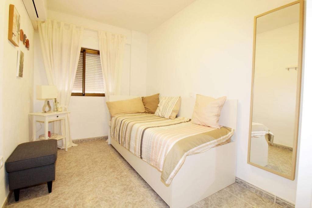 A bed or beds in a room at JACINTO 2 Playa Fuengirola