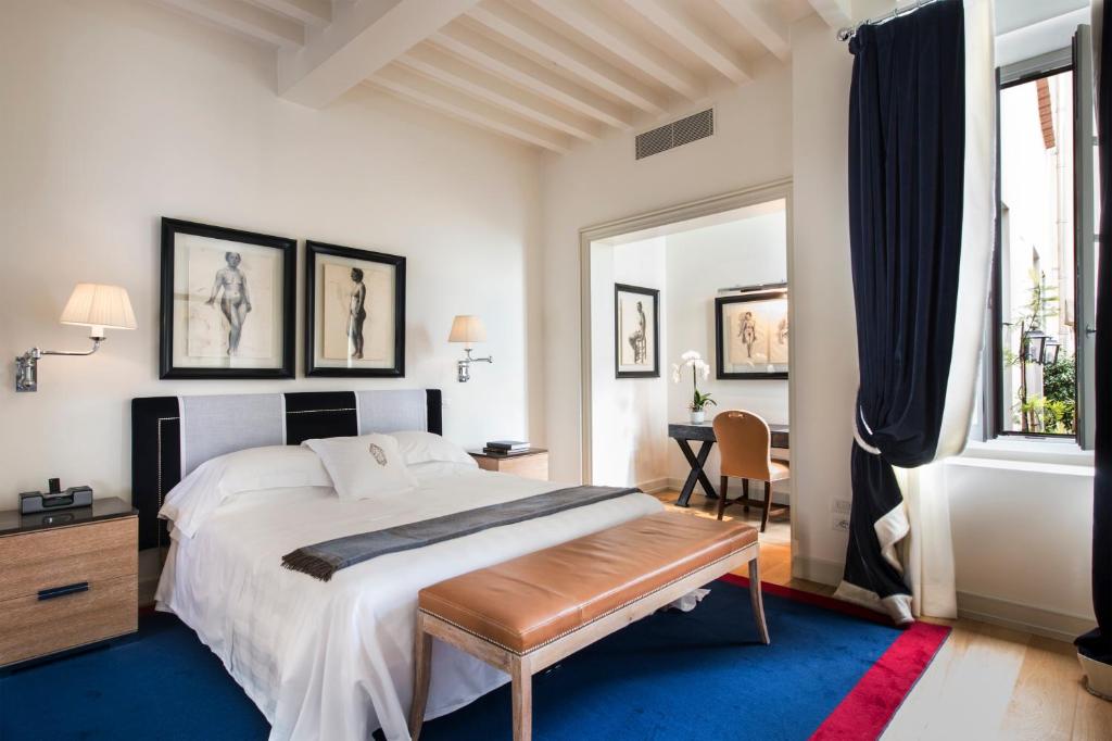 Postel nebo postele na pokoji v ubytování Palazzo Vecchietti - Residenza D'Epoca