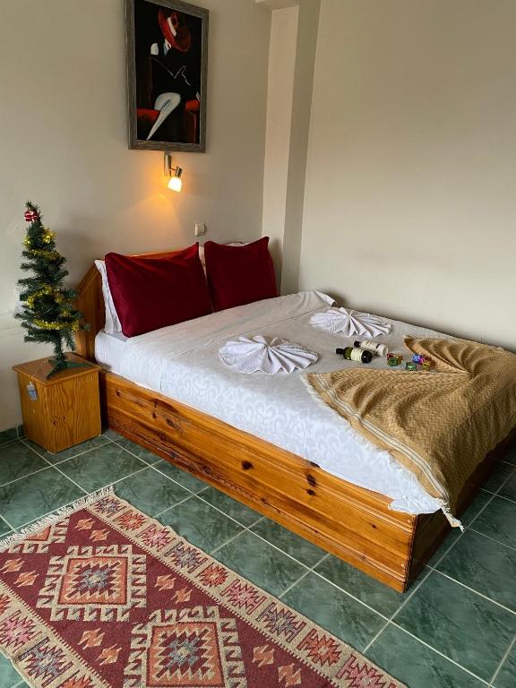 Postel nebo postele na pokoji v ubytování CAN APART KAPLICA OTEL