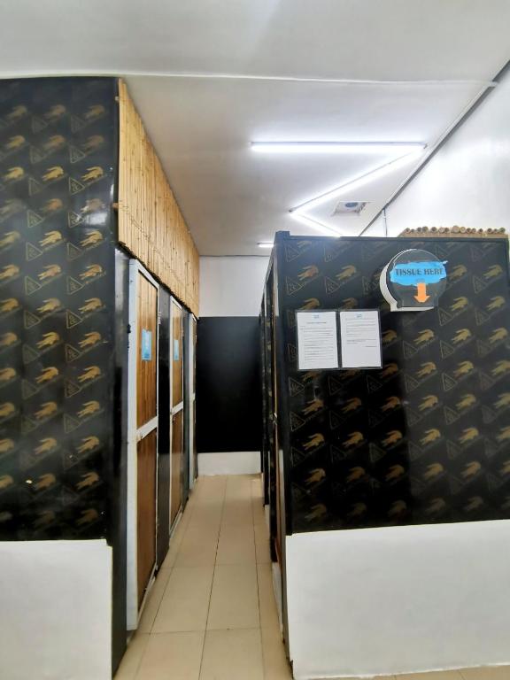 a room with a bunch of lockers in a room at Big Paul Hostel in El Nido