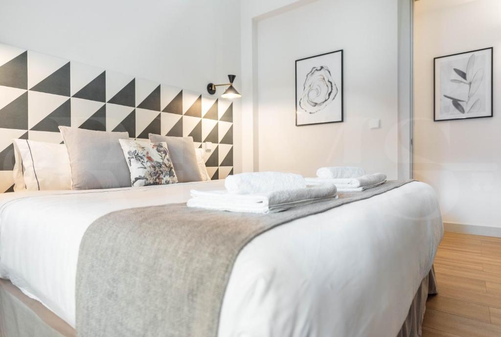 Posteľ alebo postele v izbe v ubytovaní Penthouse with private rooftop in the heart of Malaga by REMS