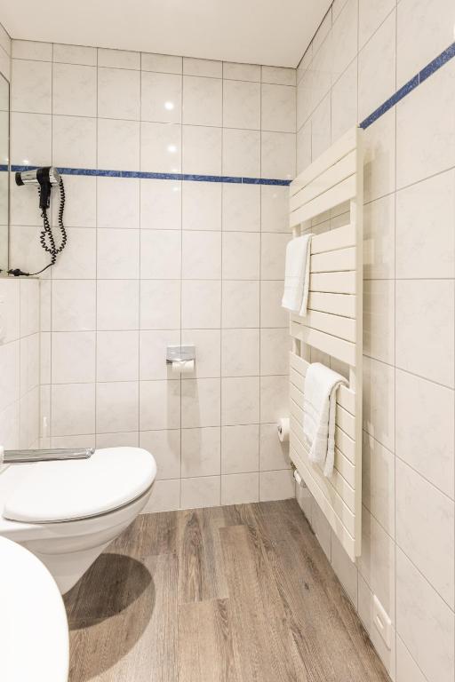 Koupelna v ubytování Hotel Flamatt