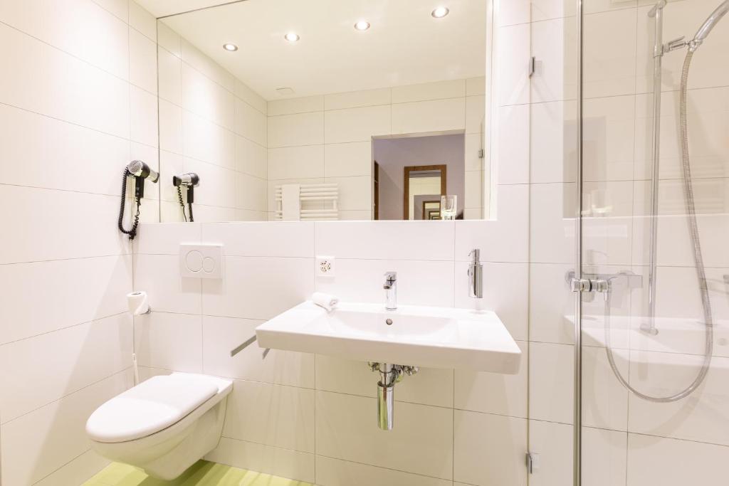 Koupelna v ubytování Hotel Flamatt