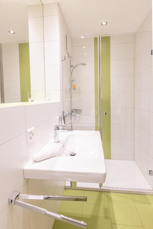 Koupelna v ubytování Hotel Flamatt
