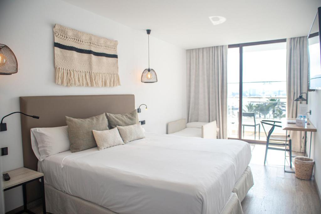 Hotel Sa Clau by Mamboにあるベッド