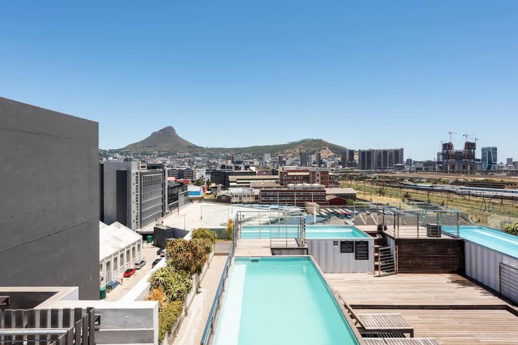 a view of a city from the roof of a building at Condo at Woodstock Quarters - Stylish 2 ensuite Bedroom Apartment with Spacious Balcony in Cape Town
