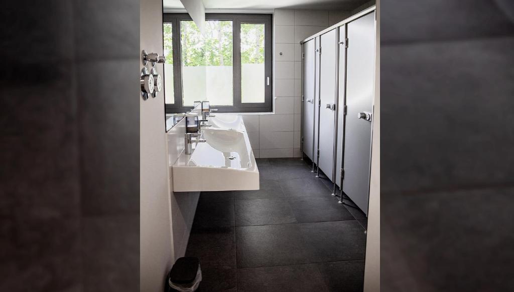 Koupelna v ubytování Hotel Garni Fischerfleck in Ismaning near Munich