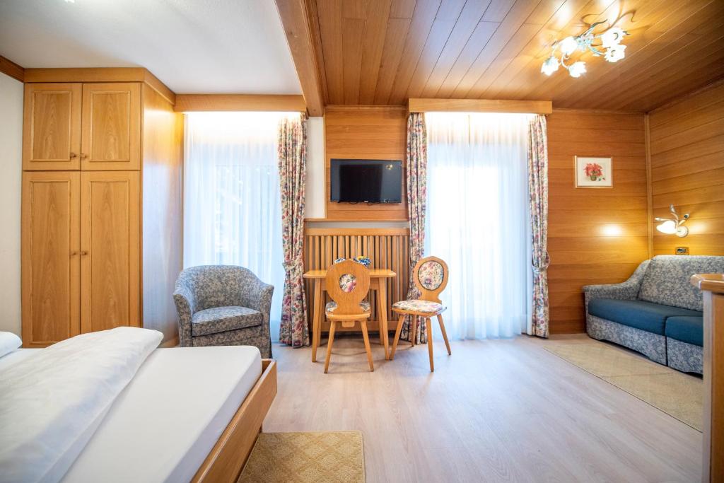 Postel nebo postele na pokoji v ubytování Garni Bondi