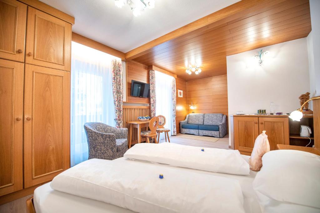 Postel nebo postele na pokoji v ubytování Garni Bondi
