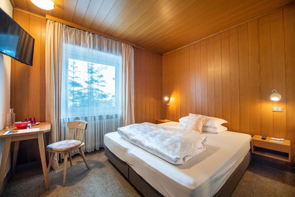 Postel nebo postele na pokoji v ubytování Garni Bondi