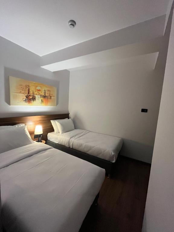 Postel nebo postele na pokoji v ubytování PALMERA HAGIA SOPHIA hotel