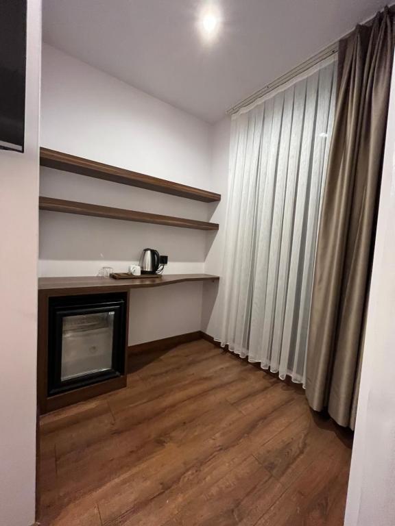 Kuchyň nebo kuchyňský kout v ubytování PALMERA HAGIA SOPHIA hotel