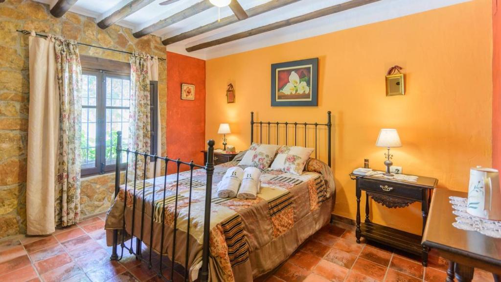 Posteľ alebo postele v izbe v ubytovaní Combinación Cortijo y Mirador Casablanca Priego de Córdoba by Ruralidays