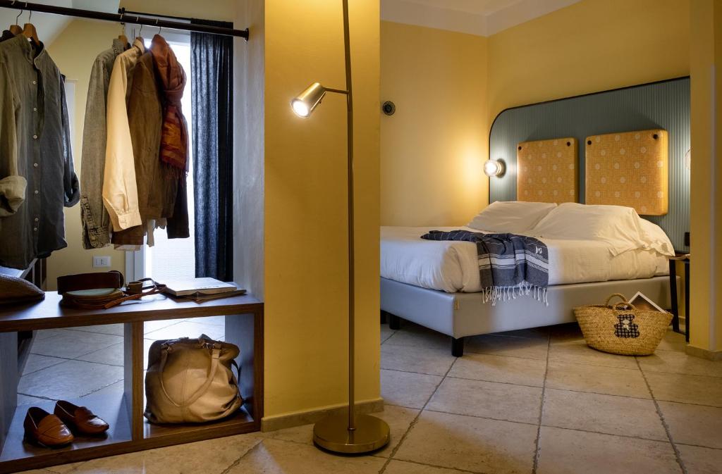 Posteľ alebo postele v izbe v ubytovaní Hotel Jolly Roger