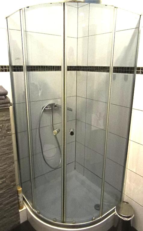 Koupelna v ubytování WRN APARTAMENTY