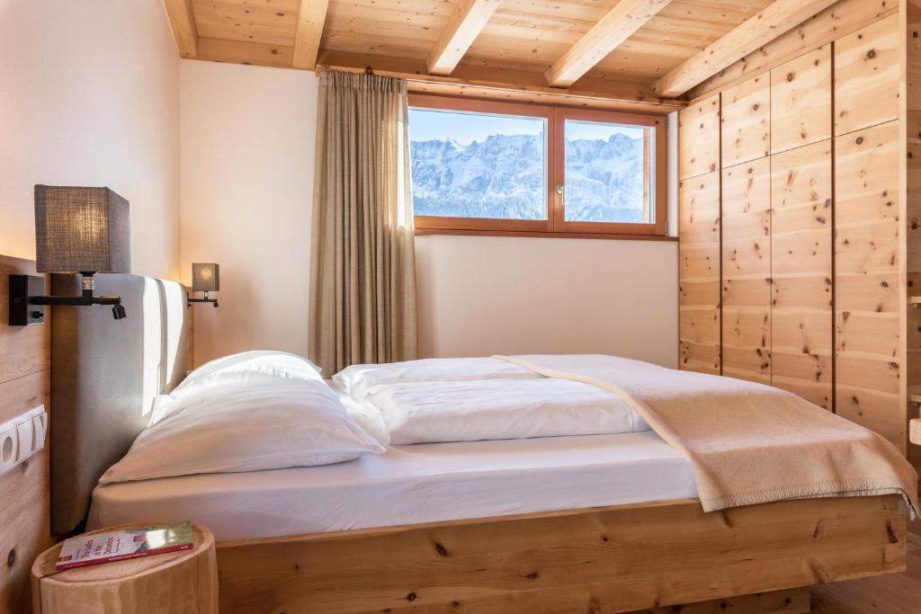Posteľ alebo postele v izbe v ubytovaní Villa Solinda App Rossini