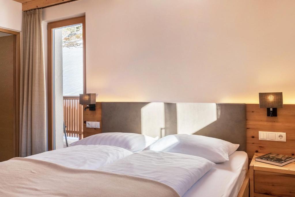 Posteľ alebo postele v izbe v ubytovaní Villa Solinda App Rossini
