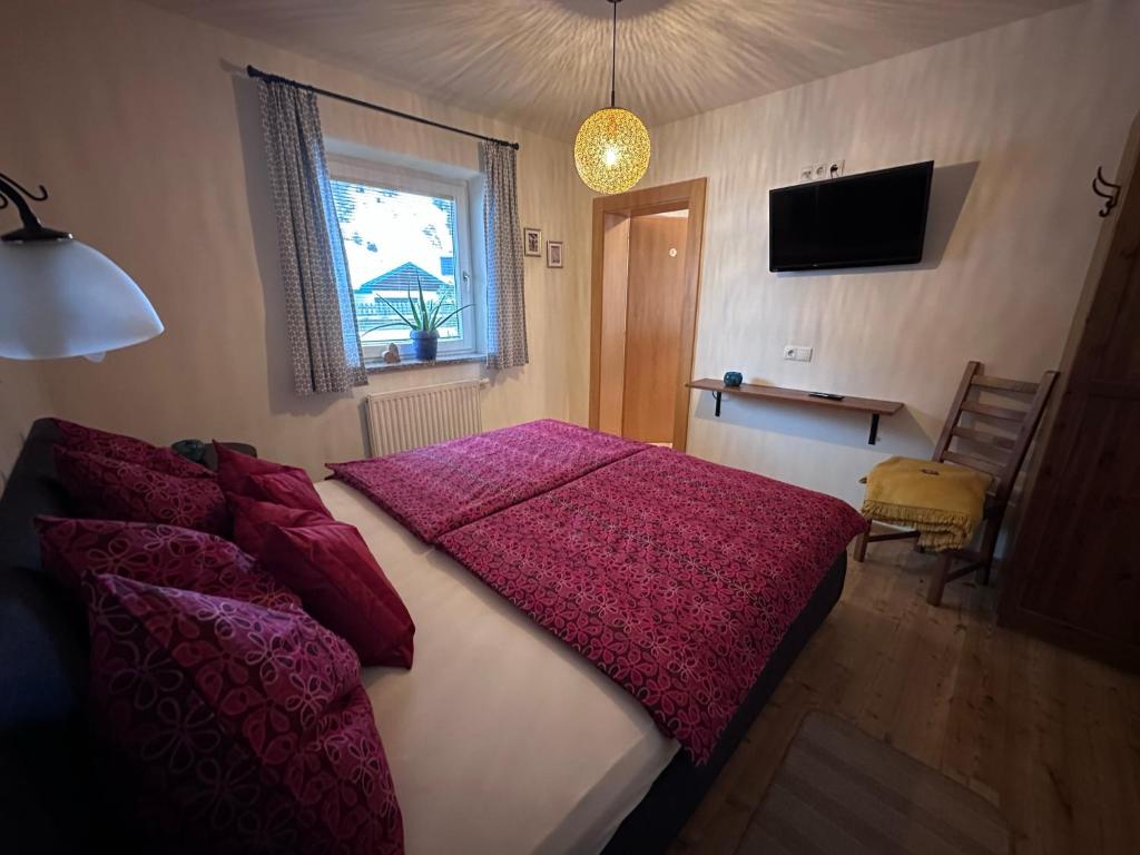 A bed or beds in a room at Kallis Appartement