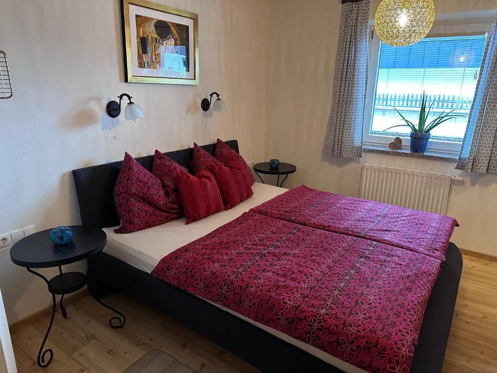 A bed or beds in a room at Kallis Appartement
