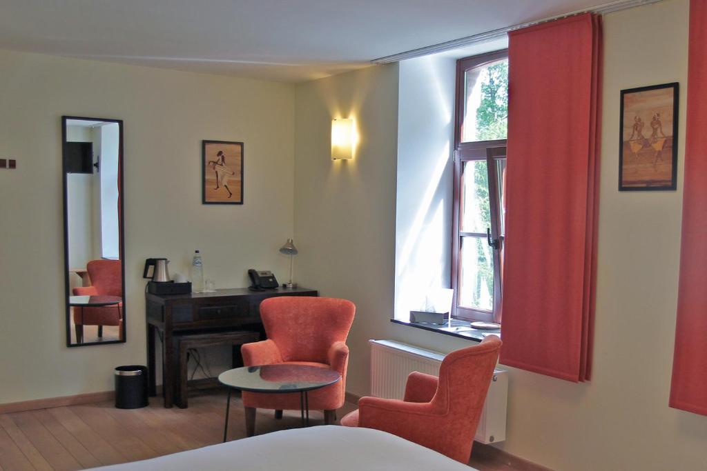 Posezení v ubytování Hôtel - Ferme du Château d'Ahin