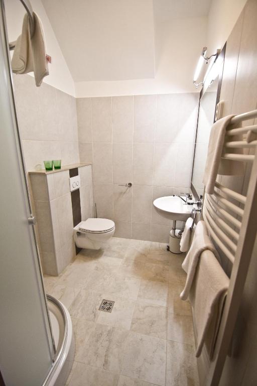 Koupelna v ubytování SasOne Rooms