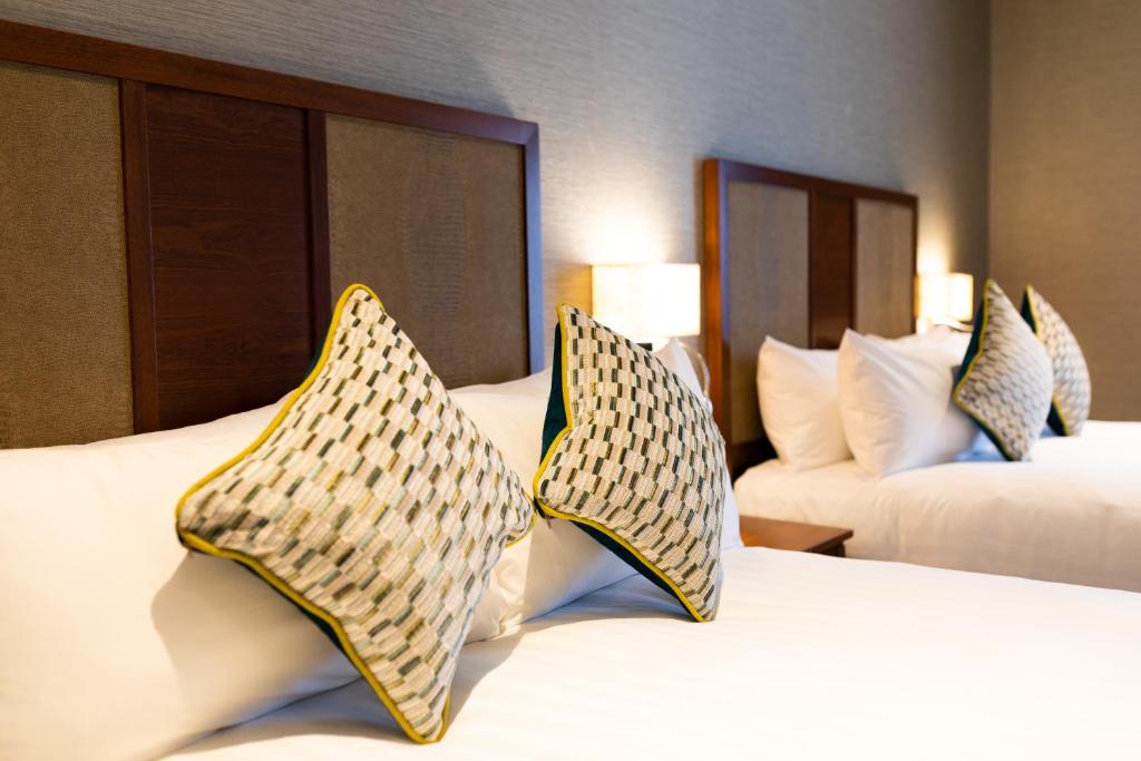 Postel nebo postele na pokoji v ubytování Lawlors Hotel