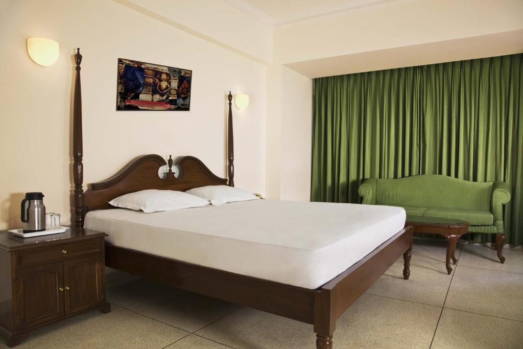 Postel nebo postele na pokoji v ubytování Hotel Alpana