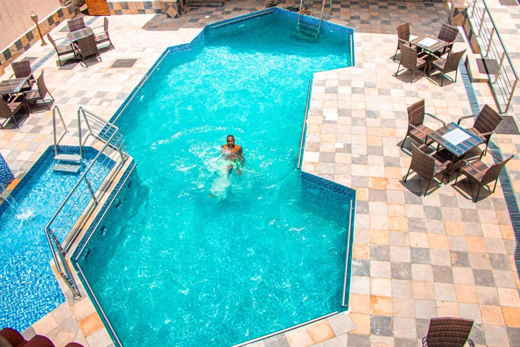 Bazén v ubytování Grand Winston Hotel nebo v jeho okolí