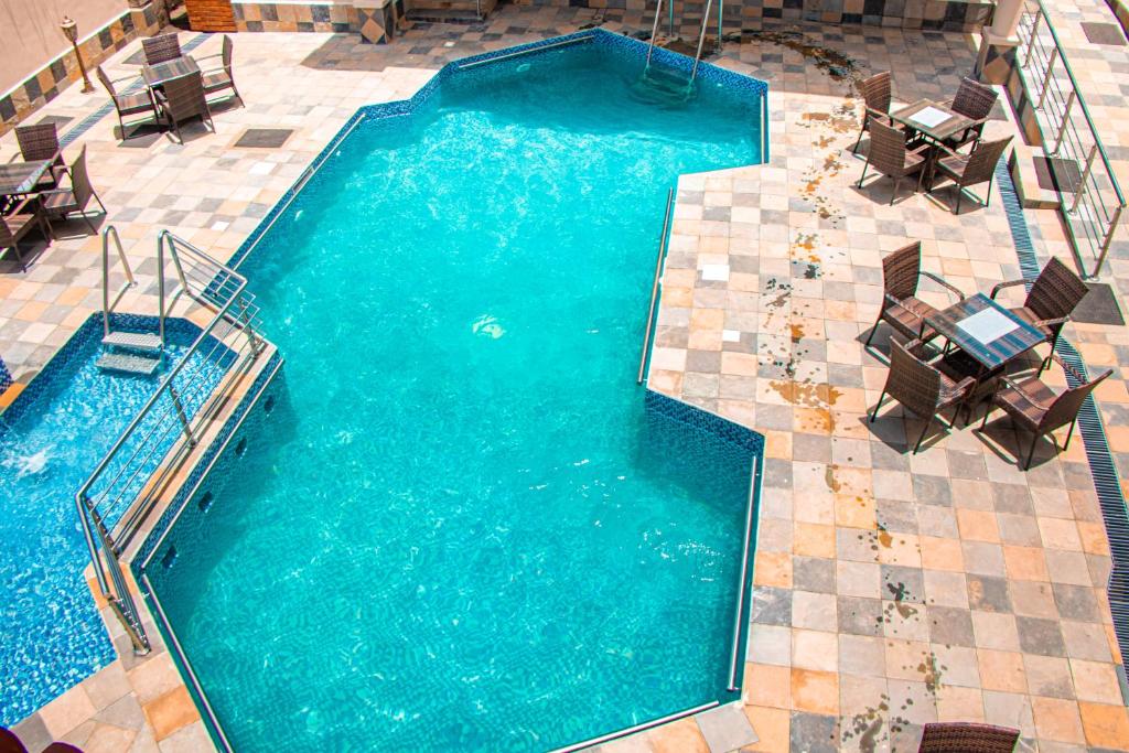 Bazén v ubytování Grand Winston Hotel nebo v jeho okolí