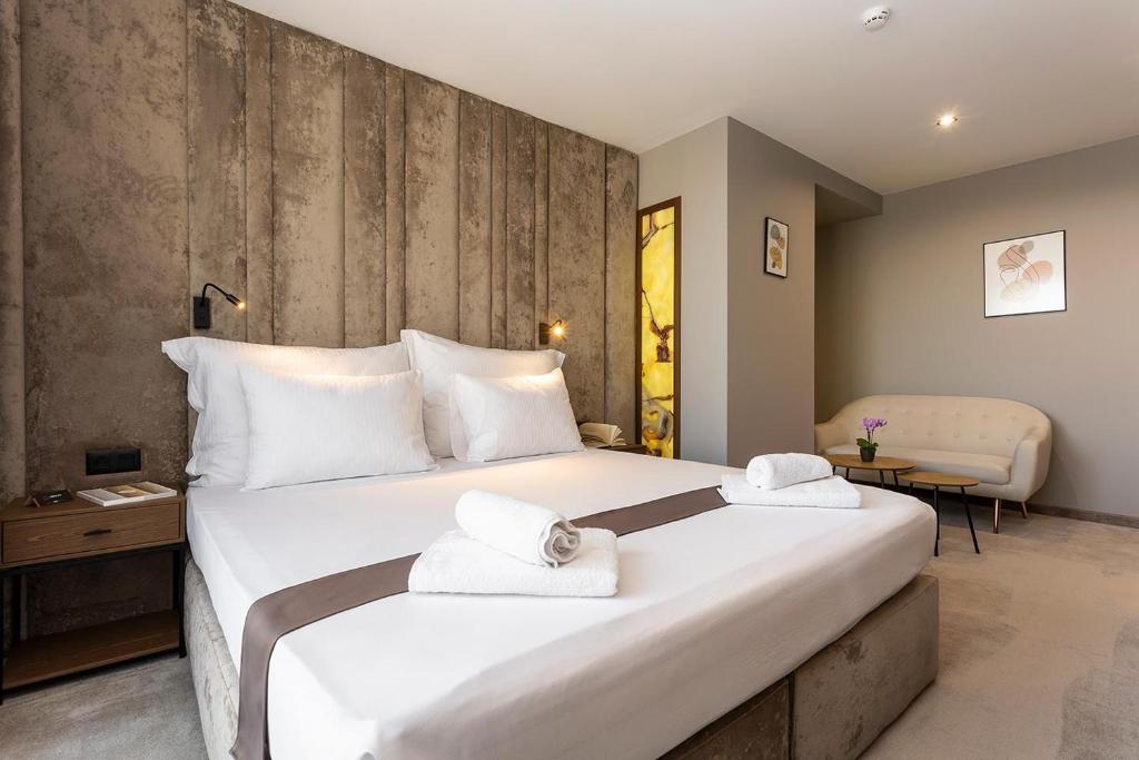 Postel nebo postele na pokoji v ubytování Abrazo Sofia Hotel by HMG