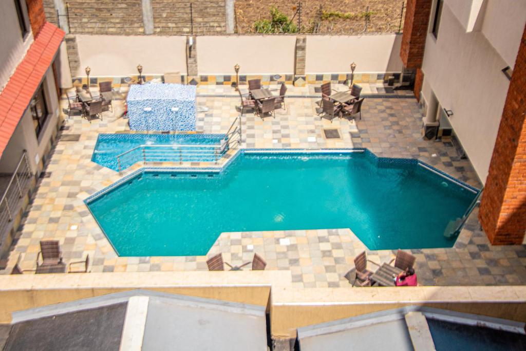Bazén v ubytování Grand Winston Hotel nebo v jeho okolí